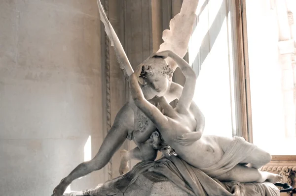 Sculpture of cupid in the louvre