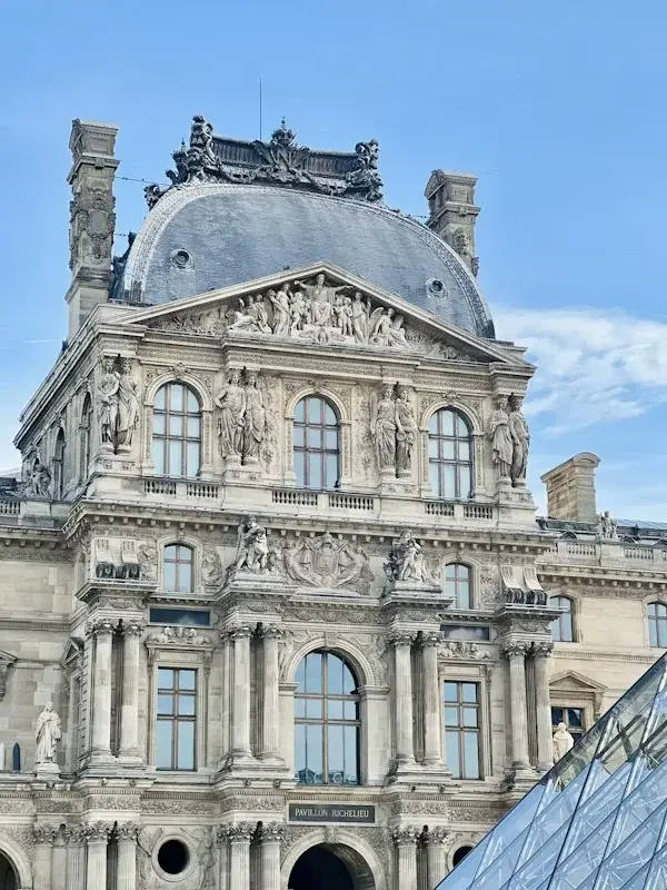 sculptures on the louvre palace facade